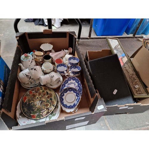 104 - A mixed lot of assorted items including a Chinese embroidery, brass ware, a pair of binoculars, spoo... 