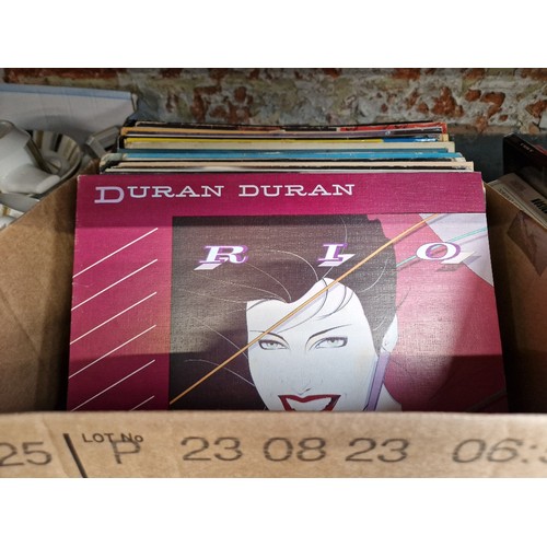 132 - A box of rock and pop LPs to include Duran Duran, Michael Jackson, etc.