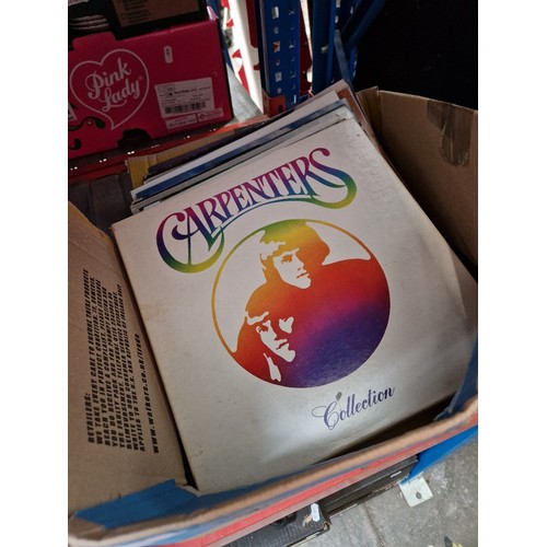 189 - A box of Carpenters LPs.