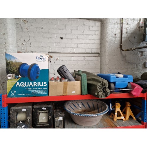 198 - A quantity of camping including an Aquarius fresh water roller, camping gas stove with extra cartrid... 