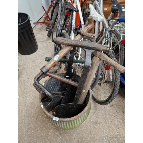 234 - A selection of vintage farming tools including Silage Cutter, Antique Ice Saw Hay Knife, A Turfing S... 