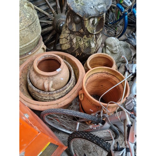 228 - 7 assorted terracotta planters