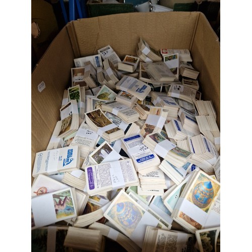 288 - A box of cigarette cards, complete sets and others.