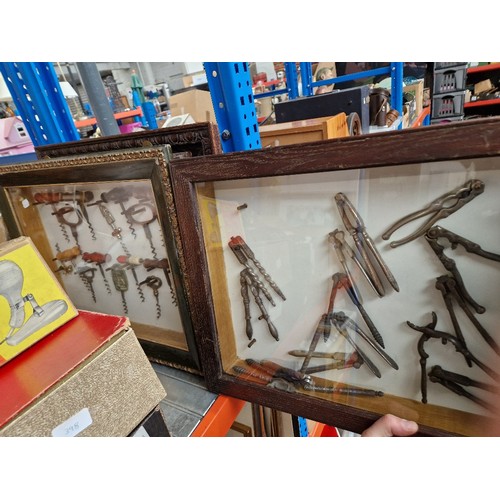 399 - Three cased displays of corkscrews, nutcrackers and bottle openers.