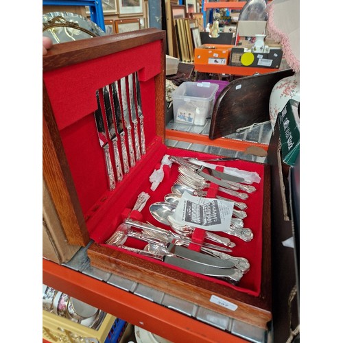 397 - A canteen of Sheffield plated cutlery.