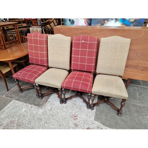 935 - A set of four oak framed dining chairs.