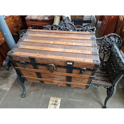 929 - A vintage leather bound travel trunk.