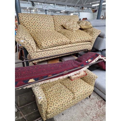 936 - Three two seater sofas with patterned upholstery.