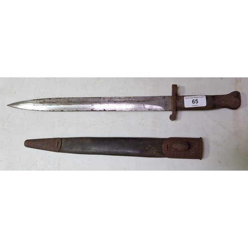 65 - A Victorian British Lee-Metford bayonet with double edged blade, approx. 30cm in length, wooden grip... 