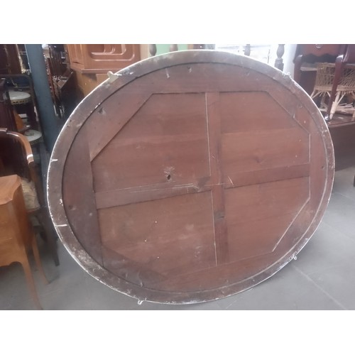 952 - A large white framed oval wall mirror, 133cm x 165cm (approx).