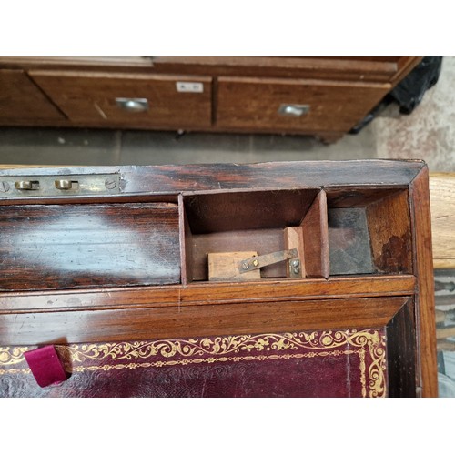 13 - A 19th century rosewood writing slope.