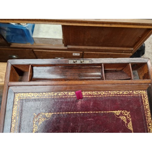 13 - A 19th century rosewood writing slope.