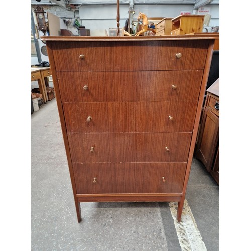 957 - A mid 20th century teak chest of drawers.