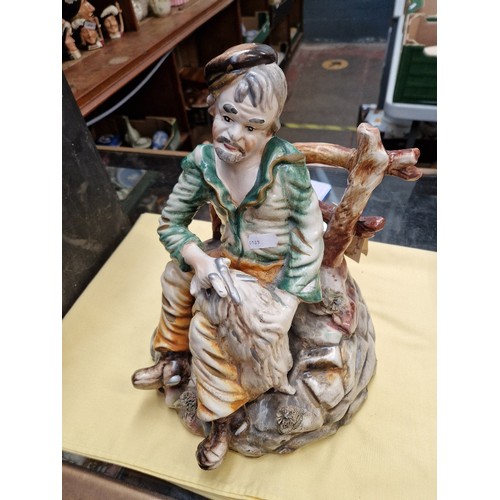 17 - A large Capodimonte figure together with a good collection of cottages to include Lilliput Lane and ... 