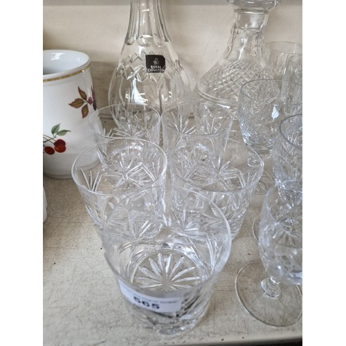 565 - Lead crystal - Royal Doulton decanter and another decanter, 34 glasses including makers such as Edin... 