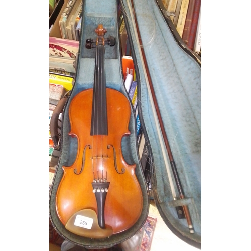 255 - A student violin, 20th century, with bow and hard case.