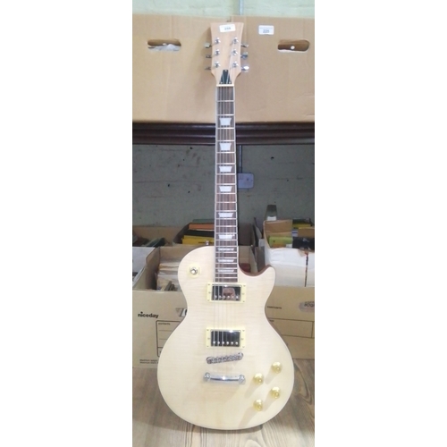 259 - A Les Paul style electric guitar.