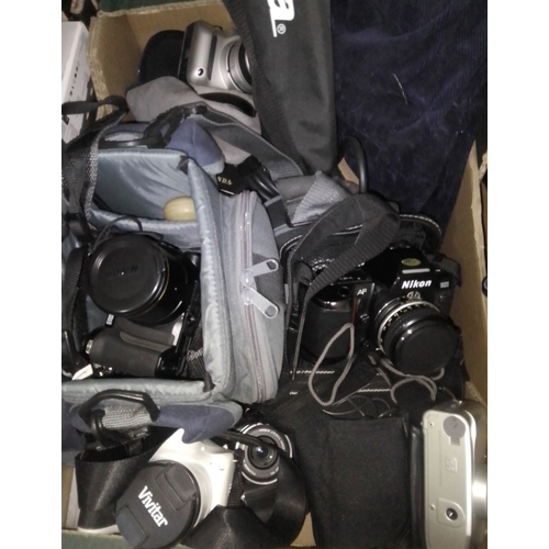 294 - Seven boxes of assorted camera equipment and binoculars.