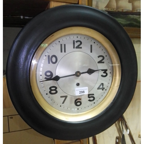 298 - Two round wall clocks.