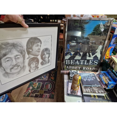 358 - A collection of Beatles memorabilia to include 2 x 3d framed posters, a Jonathan Wood drawing print,... 