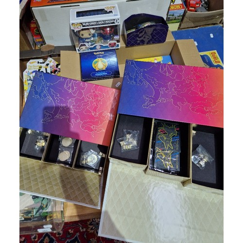 367 - A box of Pokemon items and collectables including cards, Sword and Shield games, Pokemon Phonics boo... 