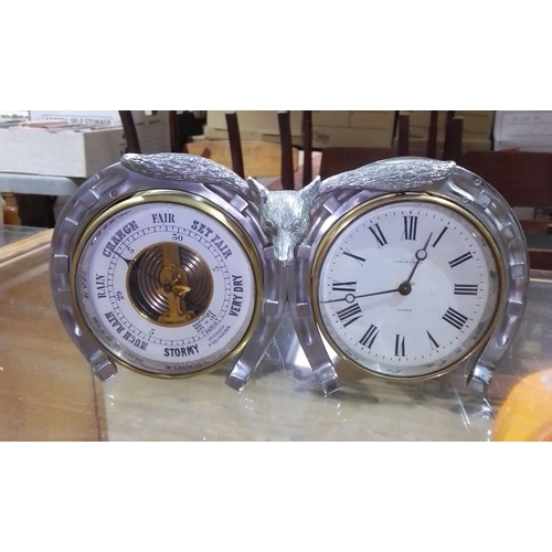 304 - A Mapin & Webb barometer and clock with fox and horse shoe surround, length 26cm.