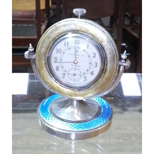 307 - An Ingersol Triumph hallmarked silver and enamelled desk clock, height 9cm.