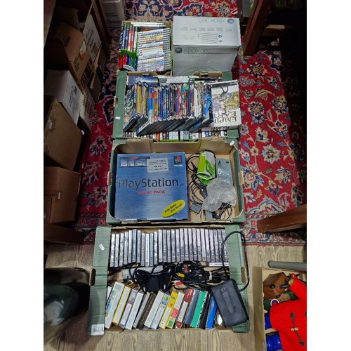 376 - An Xbox 360 & a Playstion in boxes together with 4 boxes of assorted Xbox, Xbox 360, PC & playstaion... 