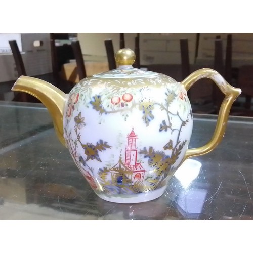 324 - A Meissen 18th century bullet shaped teapot with wishbone handle, chinoiserie decoration crossed swo... 