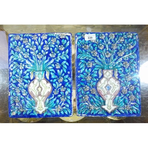 330 - A pair of Qajar tin glazed panels, late 19th century, 22cm x 28cm, removed from a large manor house ... 