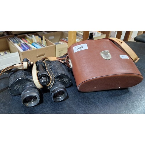 395 - A pair of Carl Zeiss Jena Deltrintem 8x30 binoculars with leather case.