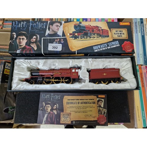 392 - A limited edition Hornby Harry Potter Hogwarts Express locomotive with gold plated parts, with certi... 