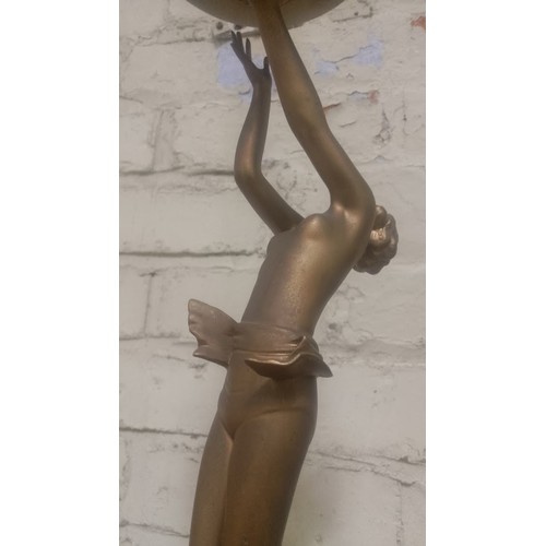 87 - An Art Deco bronze effect table lamp, height 44cm.