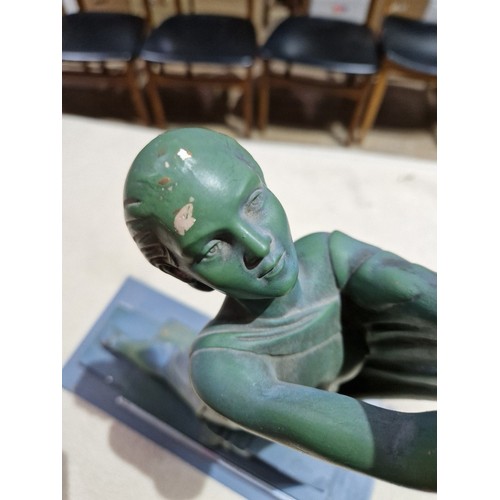 313 - An Art Deco table lamp modelled as a woman, RD 817178 243, height 37cm.