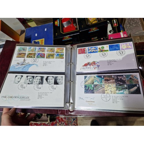 245 - Seven albums of FDCs, circa late 20th century, various commemoratives including Thunderbirds etc.