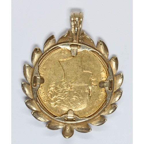 27 - Victoria 1869 shield back sovereign, hallmarked 9ct gold wreath pendant mount, length 38mm, gross we... 