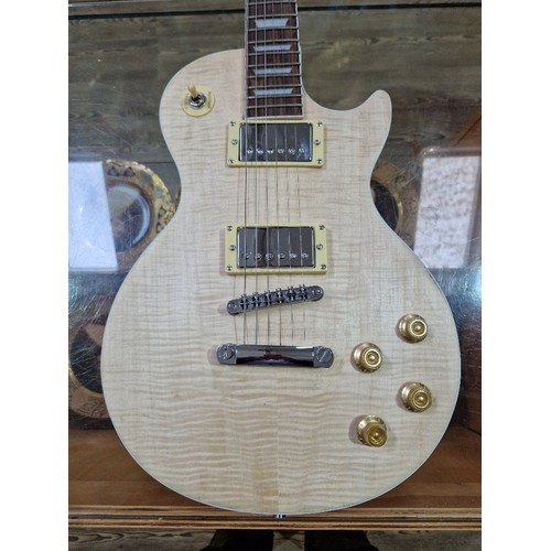 259 - A Les Paul style electric guitar.