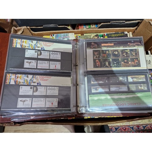 248 - Three albums of Royal Mail Presentation Packs.