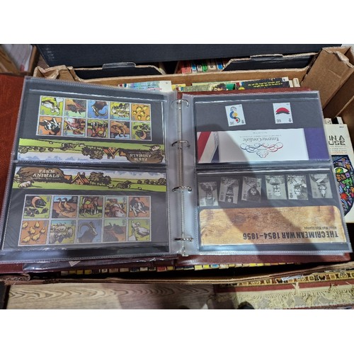 248 - Three albums of Royal Mail Presentation Packs.