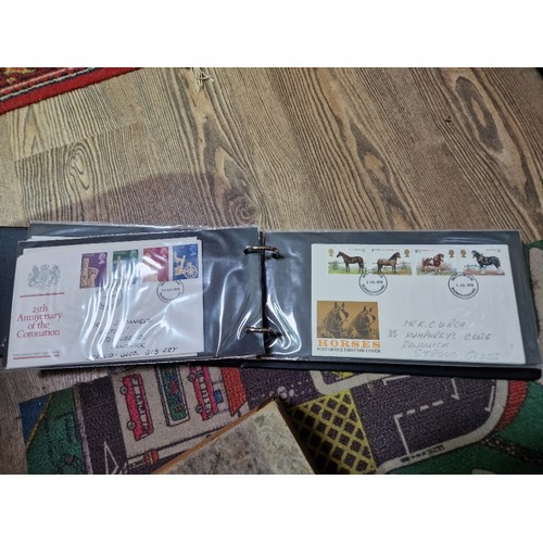 253 - A box of assorted mint presentation packs and FDCs etc.