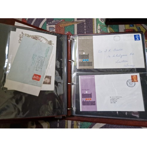 253 - A box of assorted mint presentation packs and FDCs etc.