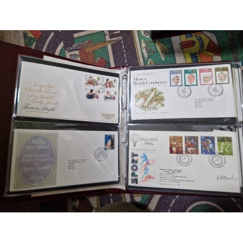 253 - A box of assorted mint presentation packs and FDCs etc.