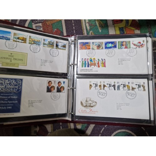 253 - A box of assorted mint presentation packs and FDCs etc.