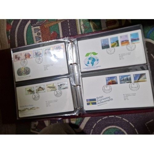 253 - A box of assorted mint presentation packs and FDCs etc.