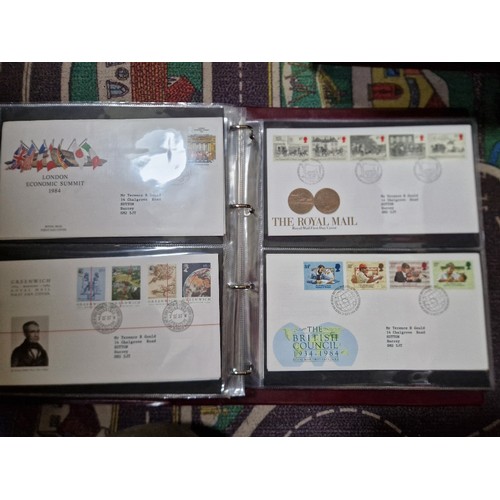 253 - A box of assorted mint presentation packs and FDCs etc.