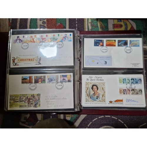 253 - A box of assorted mint presentation packs and FDCs etc.