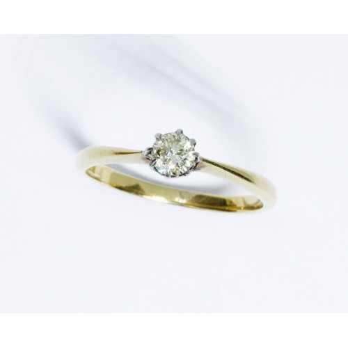 90 - A single stone diamond ring, the round stone weighing approximately 0.20 carats, marked '18ct' and '... 