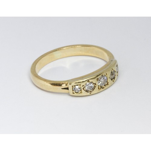 106 - A five stone diamond ring, yellow metal unmarked, gross weight 3.2g, size L.