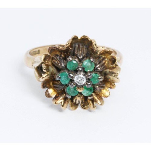 126 - A diamond and emerald cocktail ring, hallmarked 9ct gold sponsor 'RJ', London 1969, gross weight 4.9... 