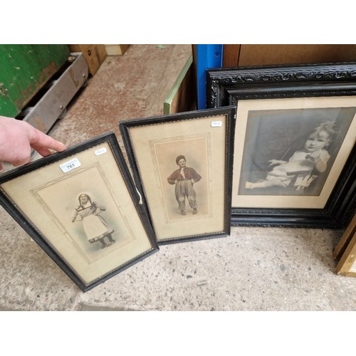 761 - Three early 20th century photographic prints of children, two signed Johnston Lancaster, each framed... 